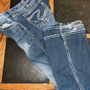 Silver twisted jeans size 32 x 33 - slightly worn and original hole details